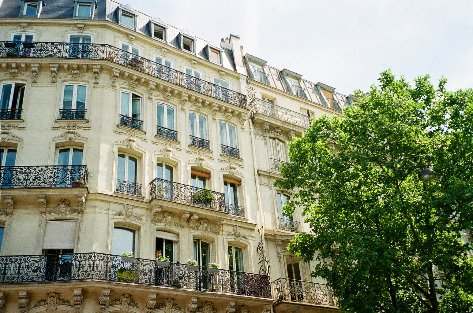 A Parisian building facade shot on 35mm film.