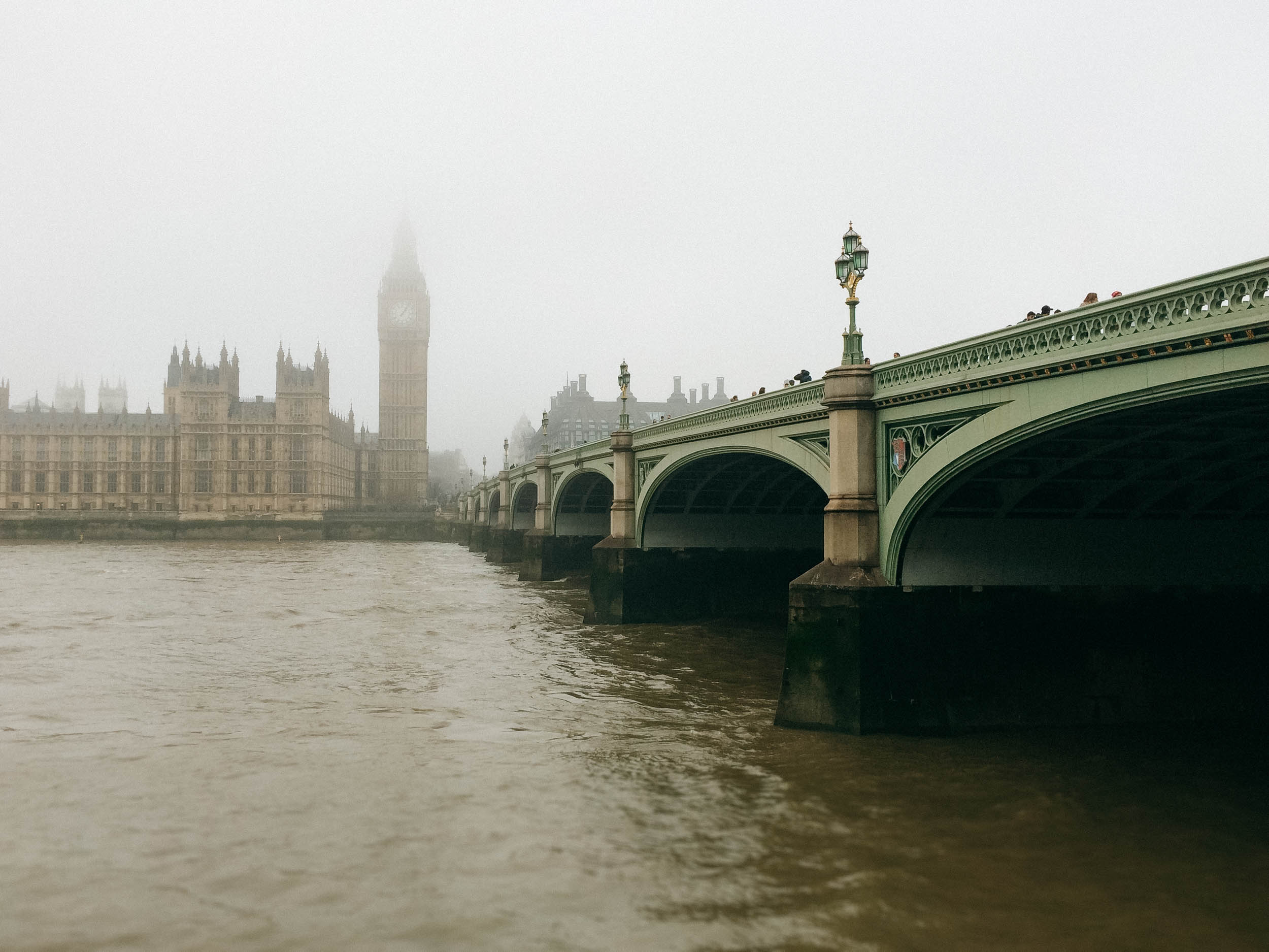 A foggy view of Westminster Bridge and Big Ben in London.