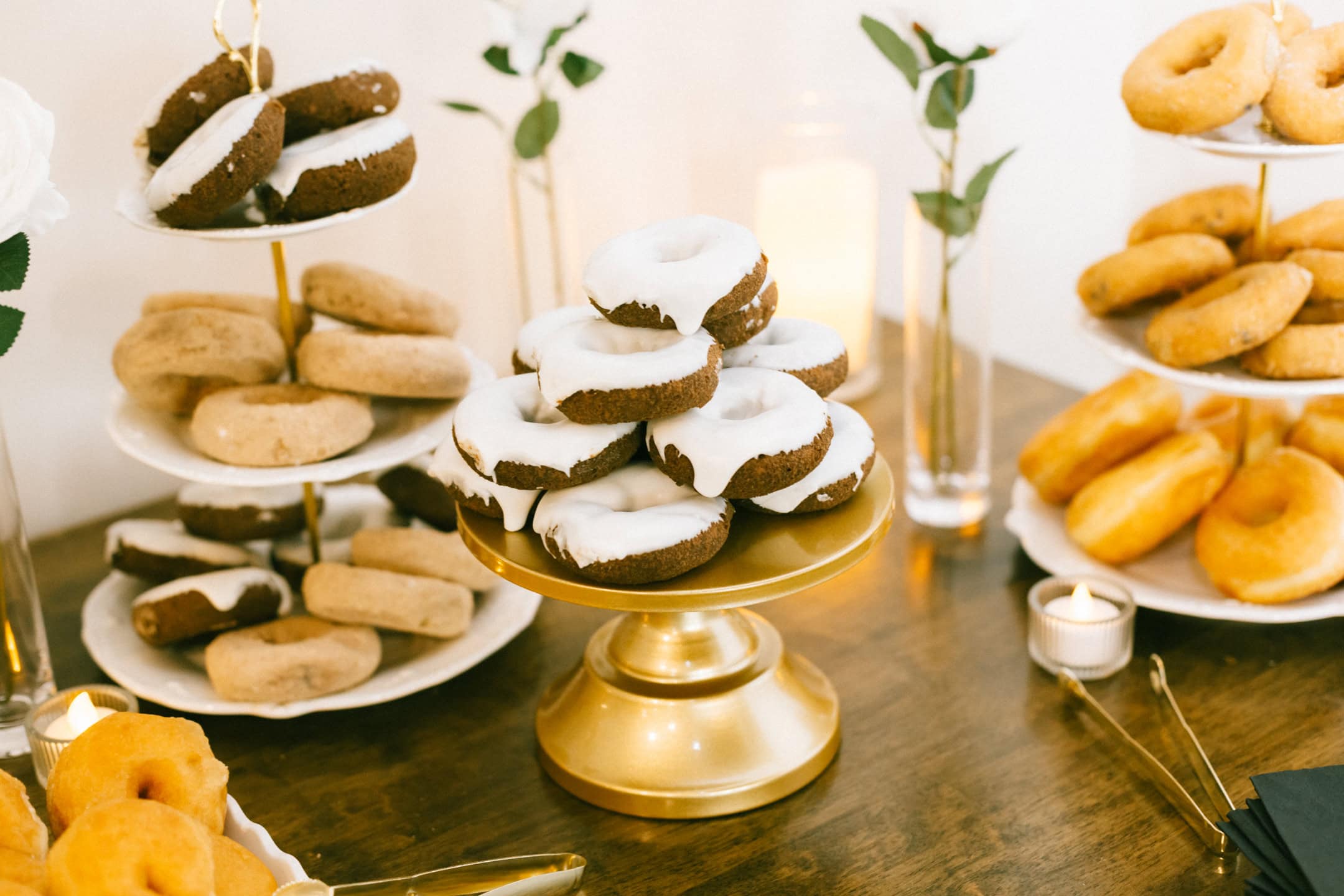 A donut dessert bar at a wedding.